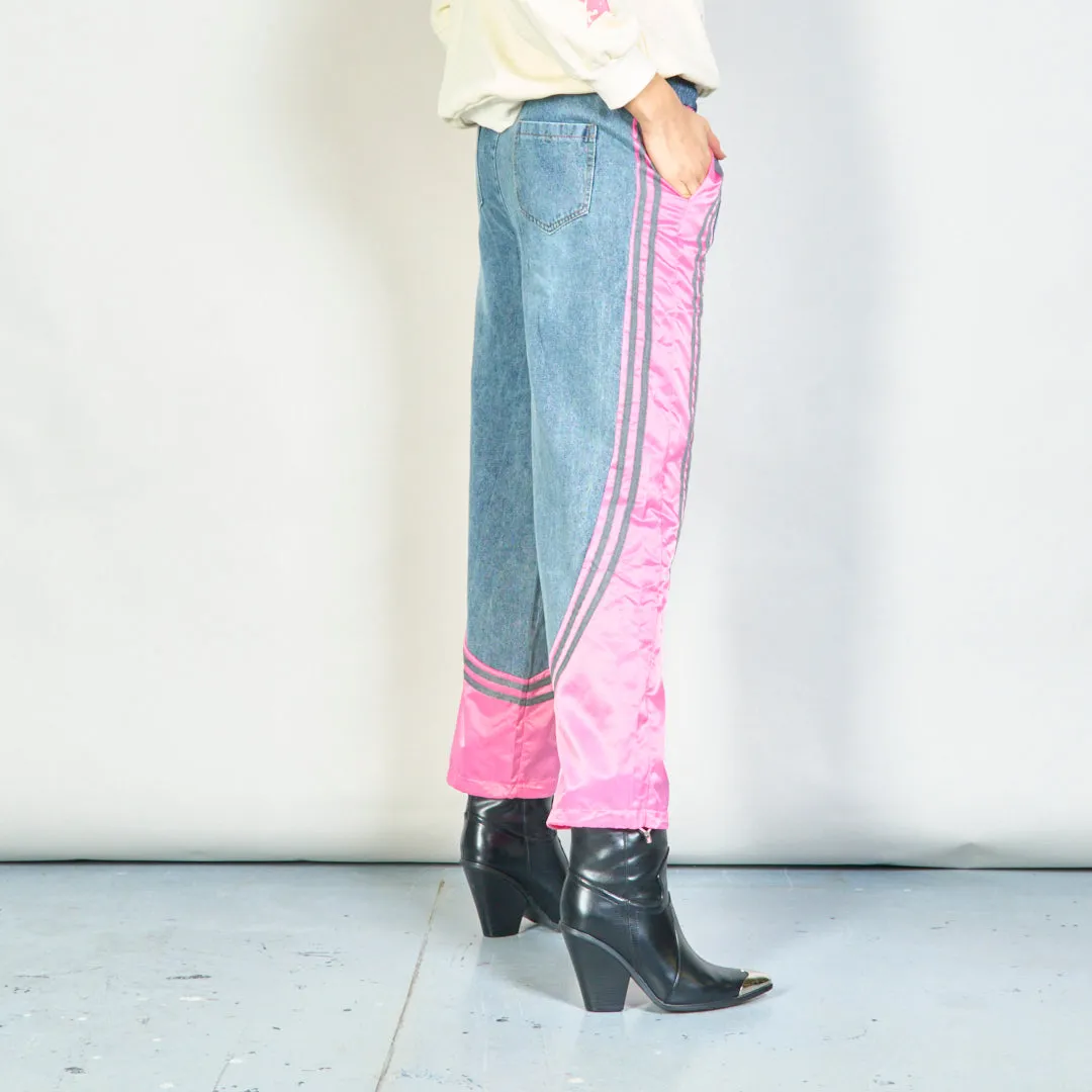 Color-block denim jogger pants with side stripes wholesale