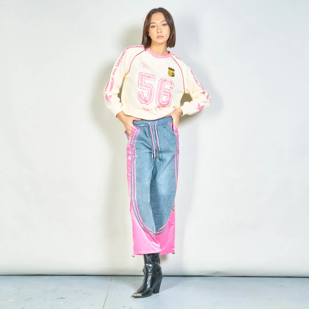 Color-block denim jogger pants with side stripes wholesale