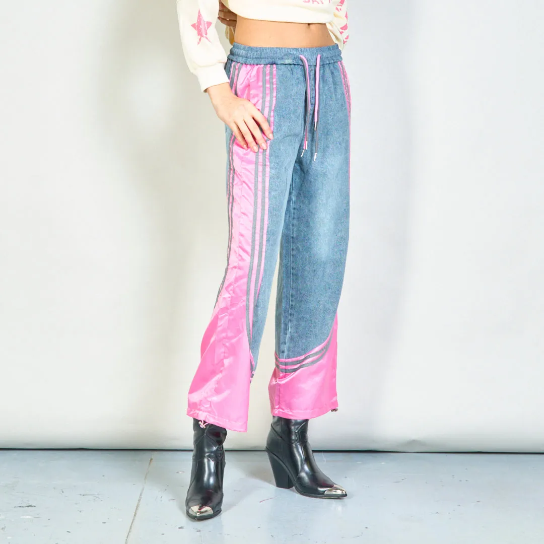 Color-block denim jogger pants with side stripes wholesale