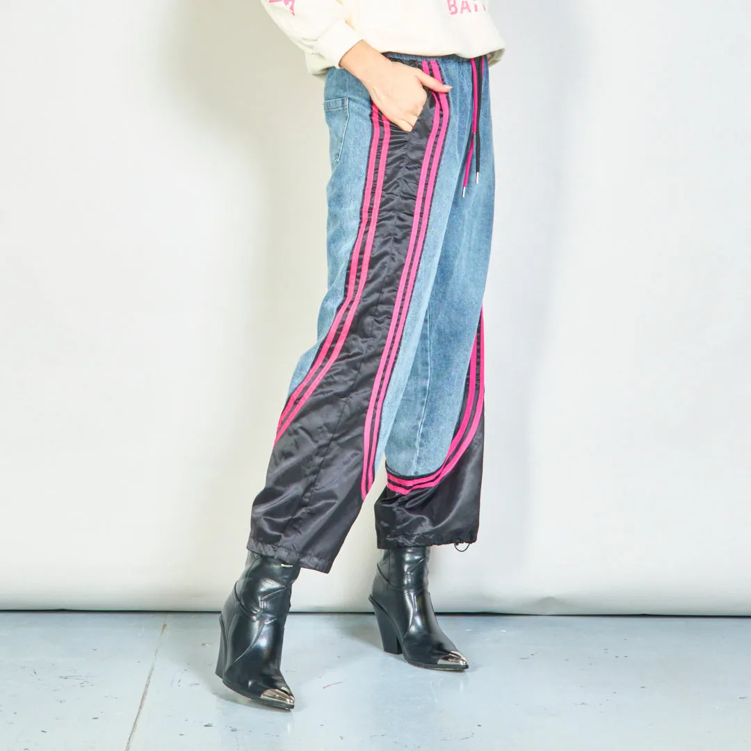 Color-block denim jogger pants with side stripes wholesale