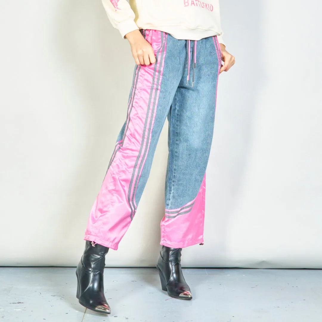 Color-block denim jogger pants with side stripes wholesale